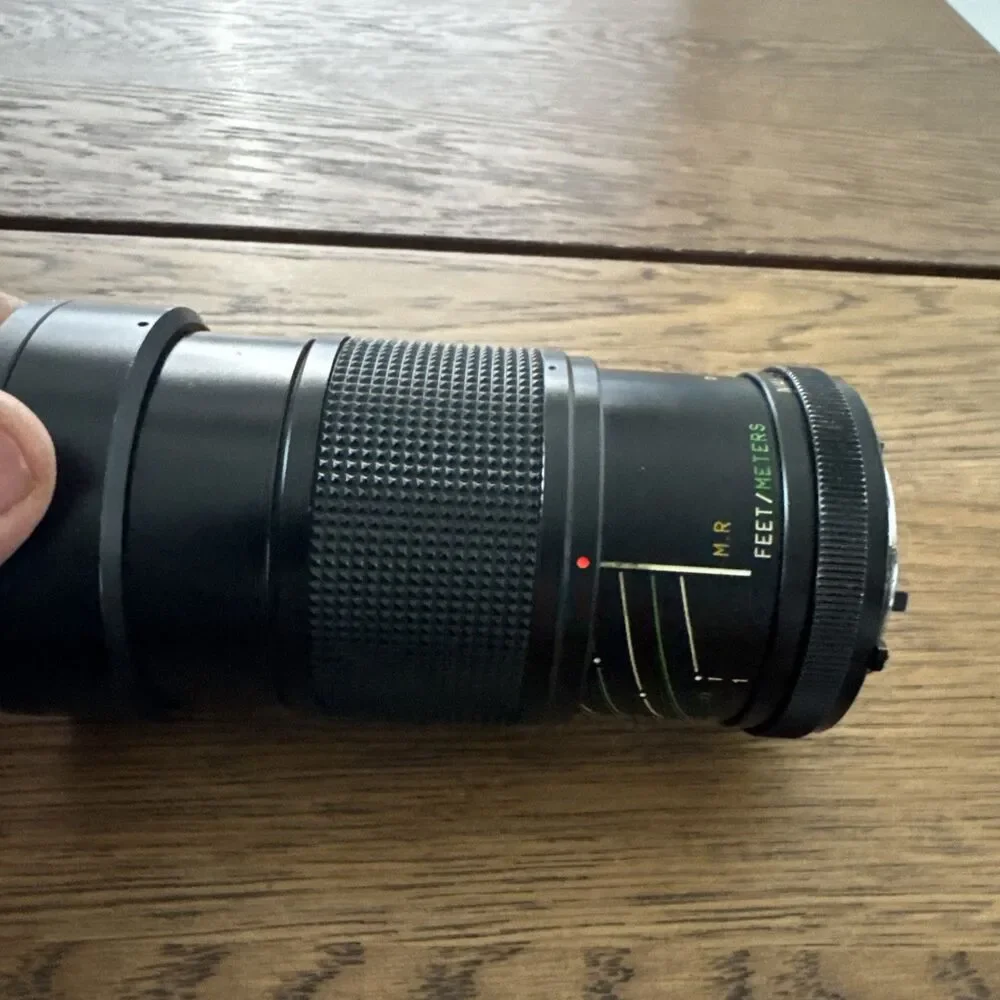 vintage Vivitar 28-85mm f/2.8-3.8 MC macro focusing camera lens.